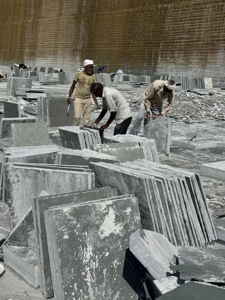 Kota stone slabs stacked on edge at the quarry